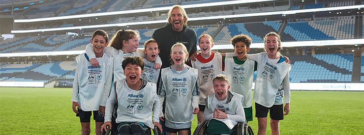 Grassroot champions on the pitch at Allianz stadium with Owen Wright