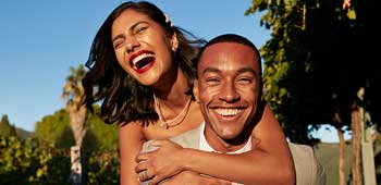 A happy smiling couple on their wedding day.