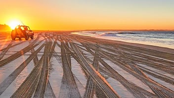 The Melbourne skyline with the River Yarra in the foreground.