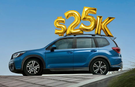 25K balloon over a car