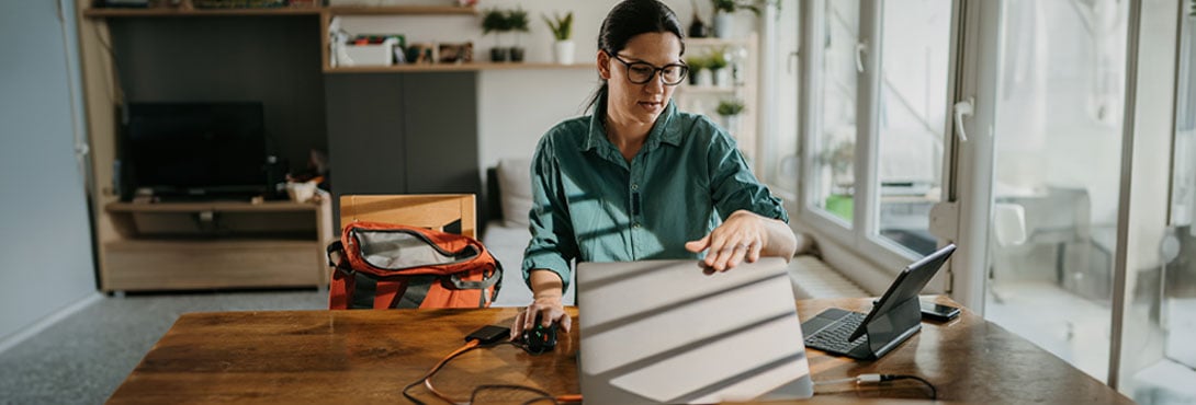 a woman testing a battery on her dining table