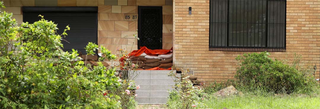 Sandbags covering a front door