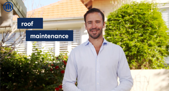 man standing in front of a house