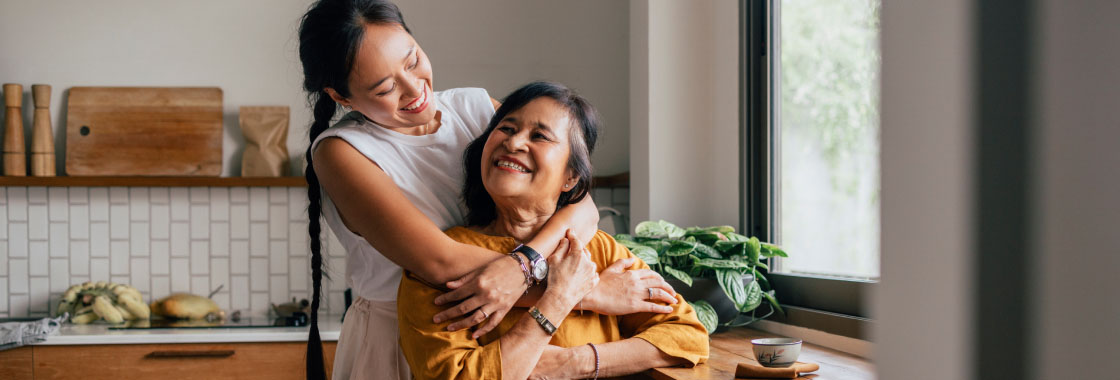 Grandmother and granddaughter together in the kitchen