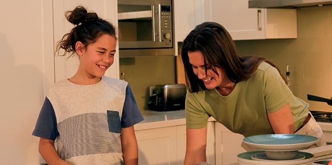 A couple relaxing on a sofa together