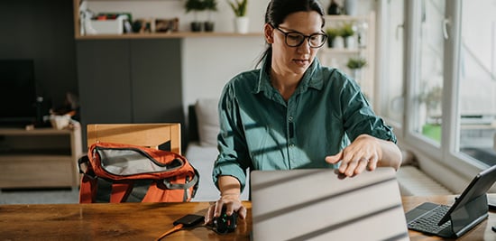 a woman testing a battery on her dining table