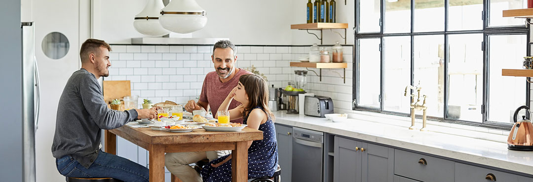 A family eating breakfast at the table