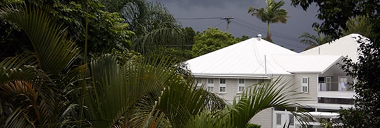 Dark and stormy clouds above a house