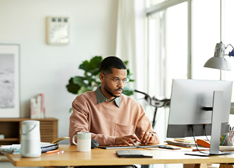 Man working on a desktop
