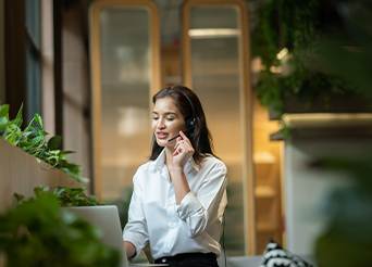 Woman talking into a headset