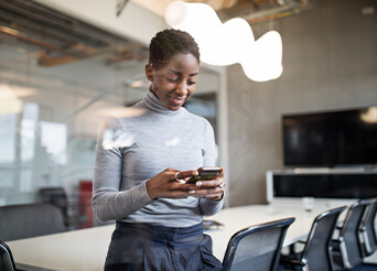 woman looking at a mobile