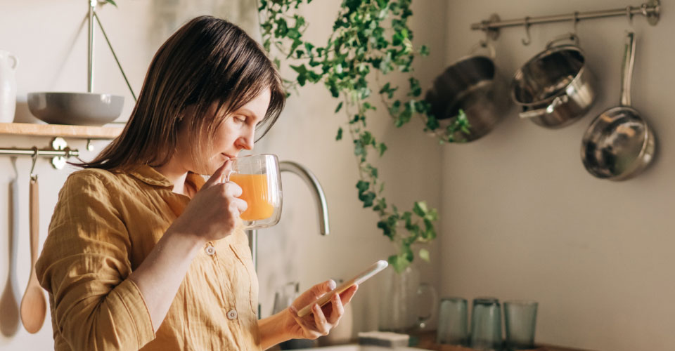 A woman viewing her mobile phone screen